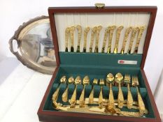 A part set of Japanese gilt metal flatware, all inscribed Lifetime, with floral decoration to