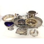 An assortment of Epns including a footed drinks tray with raised pierced gallery, swing handled