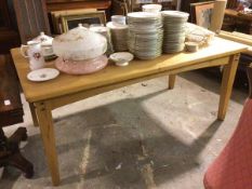 A contemporary oak farmhouse table, with moulded edge, on straight tapering supports (77cm x 179cm x