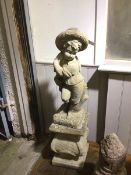 A composition garden statuary, Boy with Hat, on plinth base (110cm)