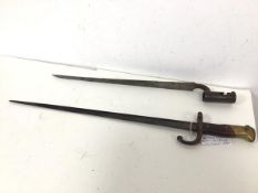 An early 19thc socket bayonet, stamped to blade B16 under crown, also E.X., socket inscribed P-
