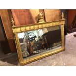 A Regency style gilt mirror, with bird surmount and urn finials, on corinthian pilasters (87cm x