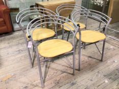 A set of four anodised metal beech seat dining chairs, c.1980/1990, with curved triple spar back (