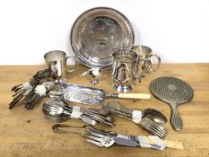 A quantity of Epns including a pierced small circular tray, a tankard, mugs, forks, spoons, hand