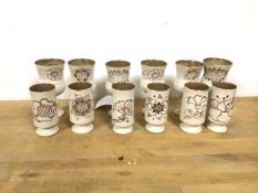 A set of twelve Orkney Porcelain stoneware glasses including six sherry glasses and six whisky