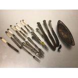 An Epns oval stand, three various silver pistol handled steel bladed knives, a collection of