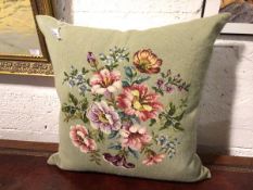 A grospoint cushion with floral design (20cm x 60cm x 60cm)