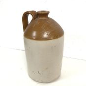 An early 20thc stoneware glazed jug with handle to side and inscribed John T. Coats & Co.,