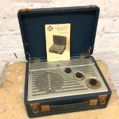 A vintage Pey All Dry battery portable model P31BQ portable radio in travelling case, with
