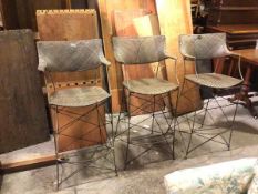 A set of three contemporary bar stools with woven backs, arms and seats on metal frames (one a/f) (