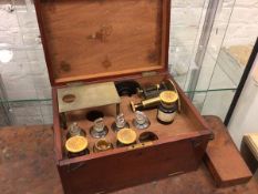 An Edwardian mahogany scientific equipment box, complete with a collection of bottles and tools