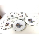 A group of five dinner plates, two with Deer to well, the others with Deer, Moose and Rabbit