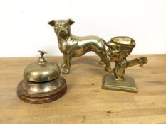 A brass dog table ornament (15cm x 20cm x 9cm) and a novelty golfer table ornament and a service