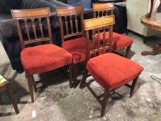 A set of four early 19thc mahogany dining chairs, with tablet top rails, on column inspired