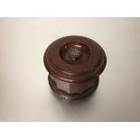A Dunhill Airtight Patented mahogany tobacco jar of octagonal form, with white metal mounted
