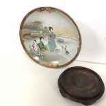 A 1920s/30s Japanese shallow bowl depicting Female figure by a Harbour, red character marks to base,