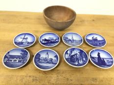 A set of seven Royal Copenhagen wall plates, each depicting a typical Danish scene, and a similar