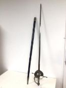 A reproduction basket hilted sword, with blue leather scabbard (116cm)
