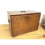 An Edwardian travelling chest, with hinged lid and candle box to interior, handles to sides (36cm