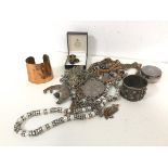 A collection of costume jewellery including gilt metal cufflinks and tie clip, with unworked stone