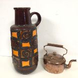 A 1960s/70s German ceramic jug, with handle to side and stamped W. Germany 409-52 to base (52cm) and