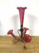 An Edwardian cranberry glass epergne with three glass flower tubes on Epns stand (44cm)