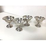 A set of four sterling weighted and reinforced footed sorbet dishes, all with initial, P. (9cm x 9.