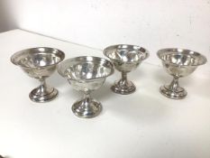 A set of four sterling weighted and reinforced footed sorbet dishes, all with initial, P. (9cm x 9.