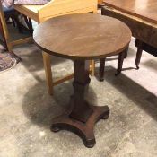 A 19thc small centre table with circular top, possibly later, on square supports and bun feet (