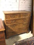 A late 19thc/early 20thc Georgian style mahogany chest of drawers fitted two short drawers above