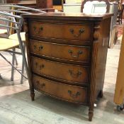 A 1930s Georgian style mahogany small chest of drawers with moulded edge to top above four graduated