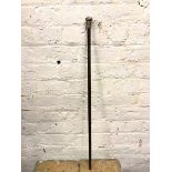 A late Victorian walking stick with white metal cap and collar (84cm)