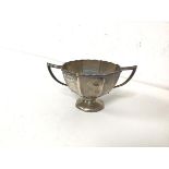 A 1912 London silver footed bowl with two handles to side (104g)
