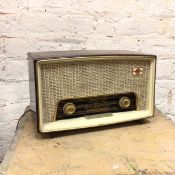 A vintage Caprice radio, model R31 (23cm x 37cm x 16cm)