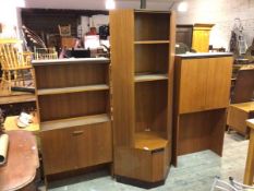 A G Plan modular wall unit comprising four sections including two cabinets, one with fall front, the