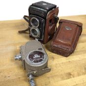 A Yashica LM camera with original travel case (a/f) and a Bell & Howell Sportster camera (2)
