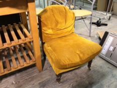 A Victorian style nursing chair with mustard corduroy upholstery, on turned supports and front