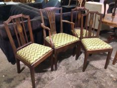 A harlequin set of dining chairs including carver and three side chairs with urn and floral inlaid