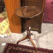 A 19thc mahogany wine table, with raised edge on turned tripod support (a/f) (74cm x d.42cm)