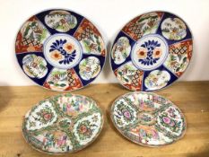 A near pair of early 20thc Chinese plates, one famille verte, the other famille rose, both marked