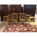 A set of six Smallbone oak dining chairs, including two carvers and four side chairs, all with