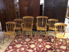 A set of six Smallbone oak dining chairs, including two carvers and four side chairs, all with
