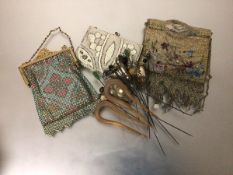 Three various lady's beaded and metalwork evening purses and a collection of vintage hair pins and