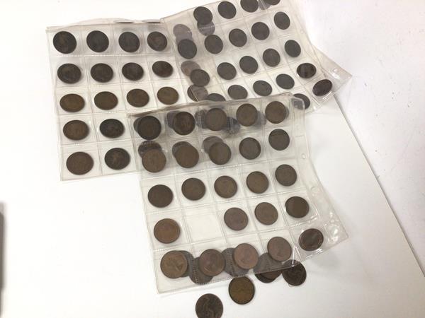 A collection of 19thc. and 20thc. pennies, most in sleeves, approximately 90