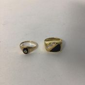 A 9ct gold signet style ring with onyx panel and illusion set stripe (R) and a 9ct gold ring with