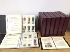 A collection of mainly reproduction medals, appoximately one hundred and eighty held within eight