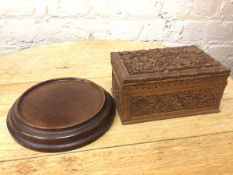 A mahogany circular base with raised edge (d.22cm) and an Indian carved jewellery box with hinged