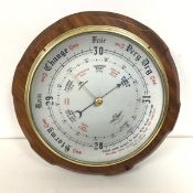A mid 20thc. wall barometer, with circular dial, marked Shortland Instrument (d.27cm)