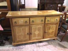 An oak Flagstone sideboard, the rectangular top with marble inlay, channelled edges above three