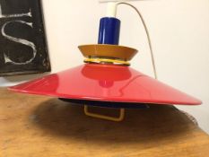 A Danish pendant light with broad red funnel shade (30cm x 44cm)